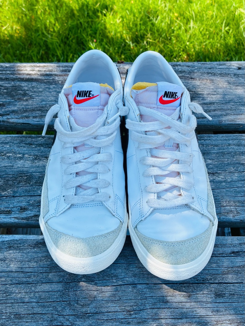 Nike White Low-Top Sneakers with Red Swoosh